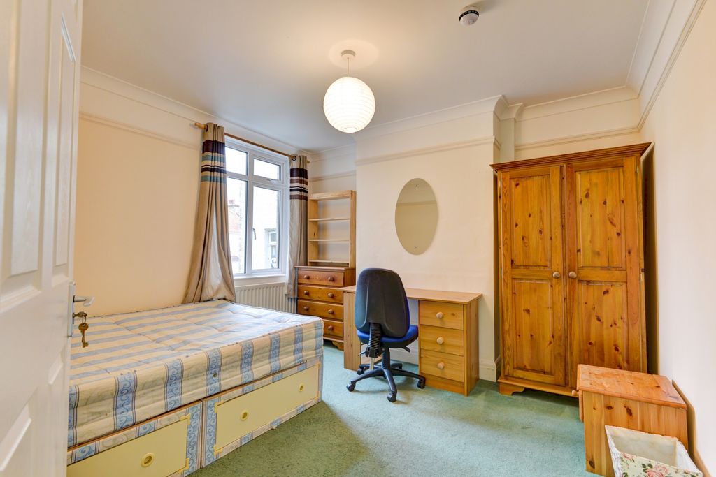 Property photo 1 of 18 A Well-Lit, Spacious Master Bedroom Featuring A La...