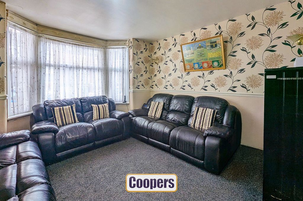 Property photo 3 of 18 Front Living Room