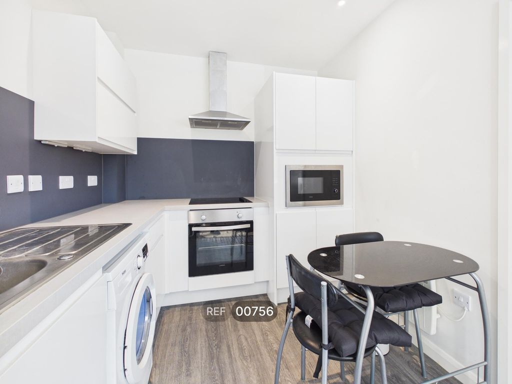 Property photo 1 of 17 Kitchen/Living Area