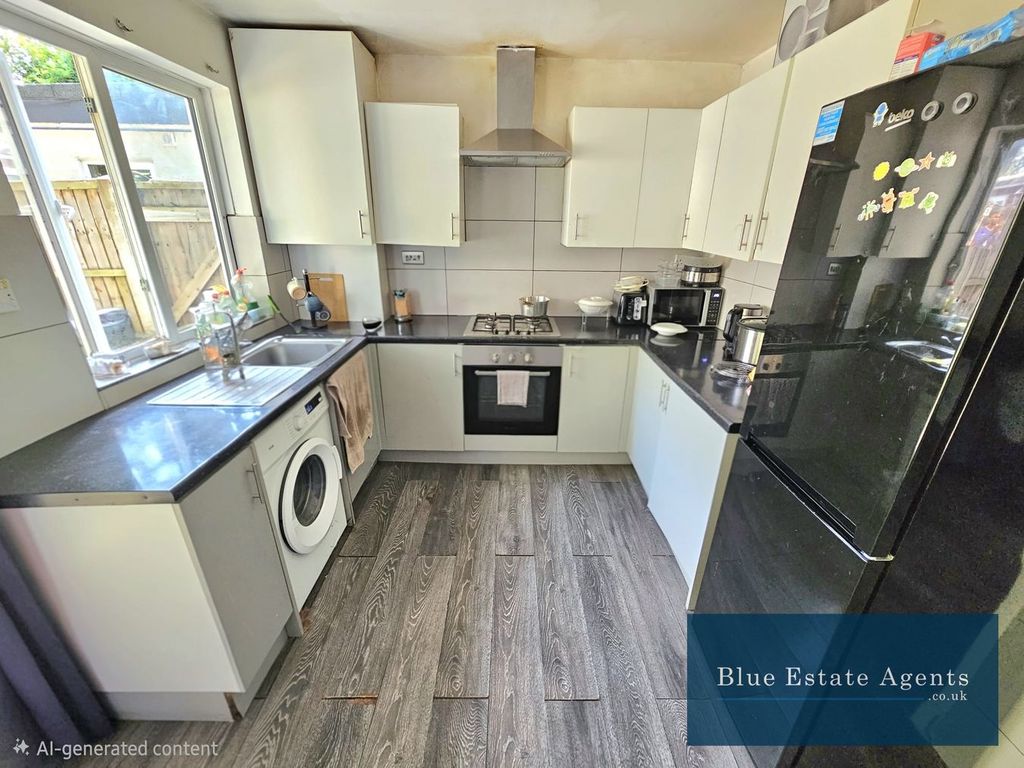Property photo 3 of 13 Kitchen