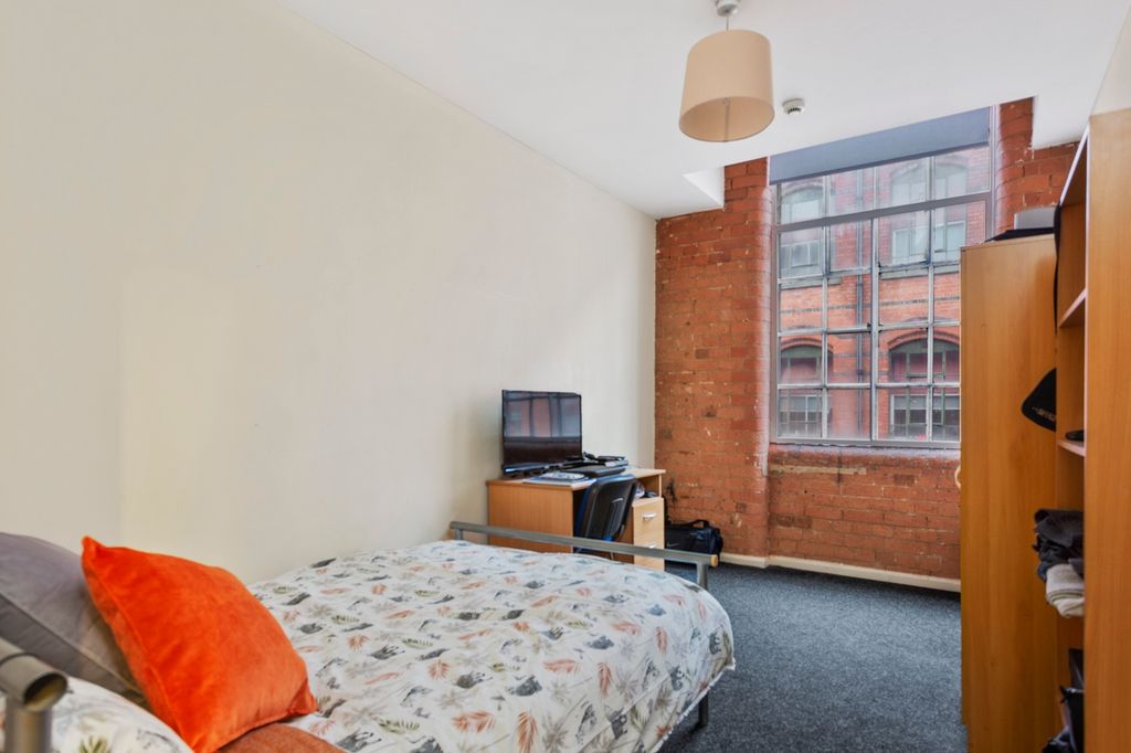 Property photo 1 of 3 A Stylish Double Bedroom Featuring A Cozy Bed With...