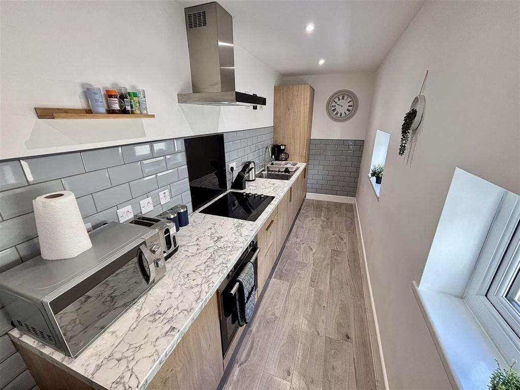 Property photo 3 of 12 Kitchen