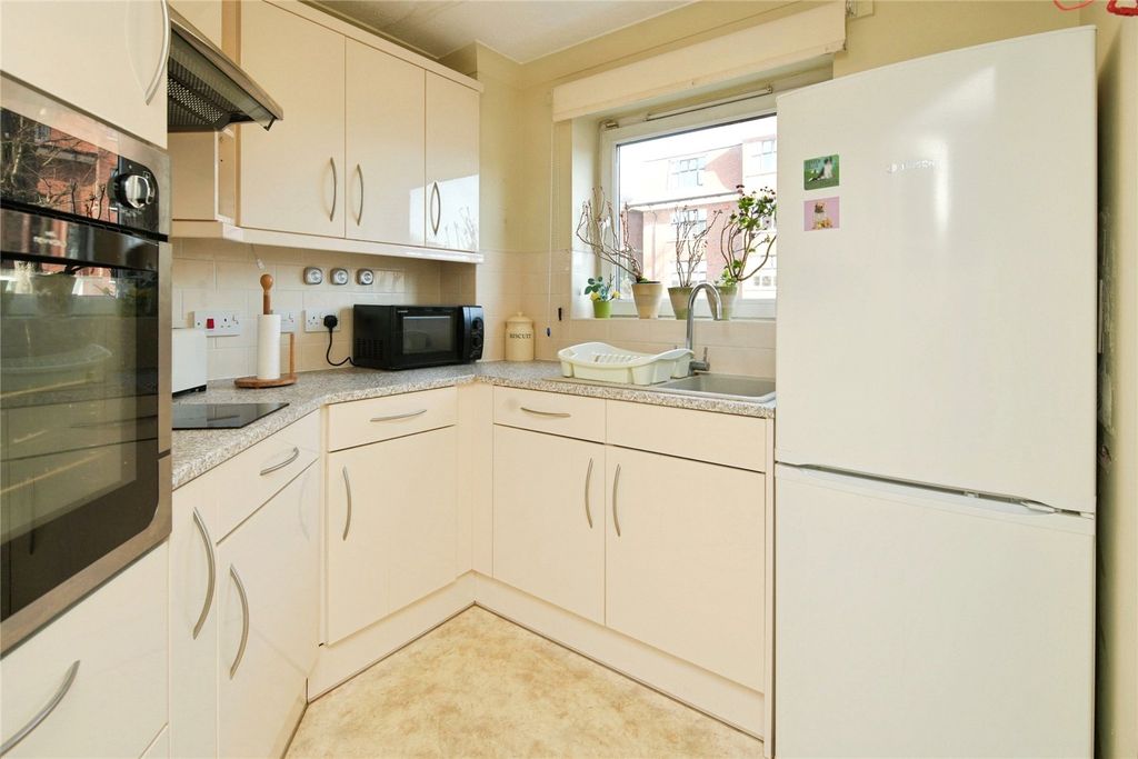 Property photo 3 of 12 Kitchen