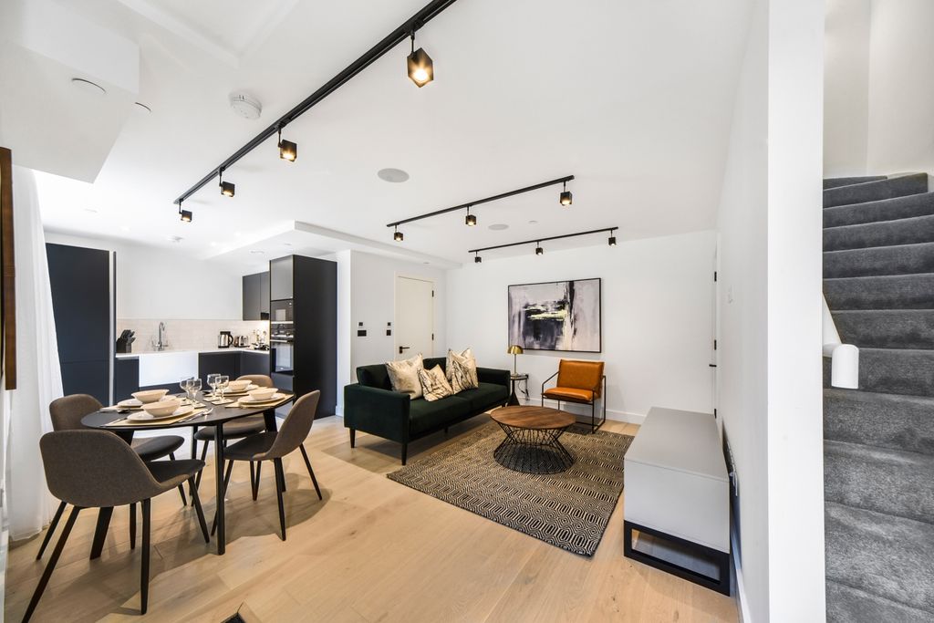 Property photo 3 of 18 Living Area