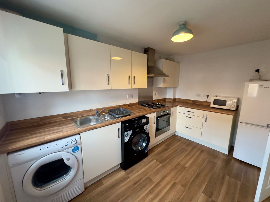 Property photo 2 of 12 Kitchen