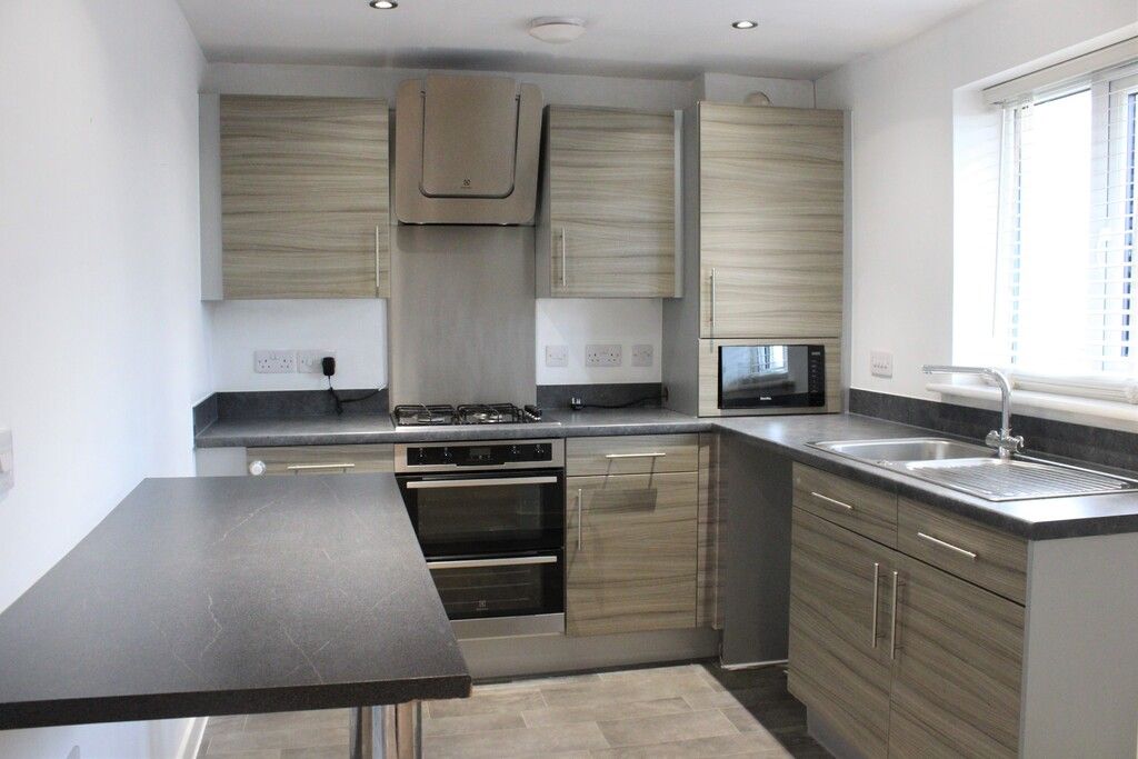 Property photo 2 of 8 Kitchen