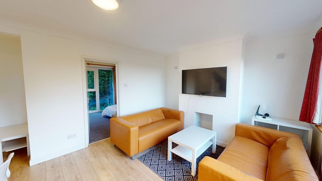 Property photo 3 of 15 A Bright And Inviting Large Modern Living Room Fea...