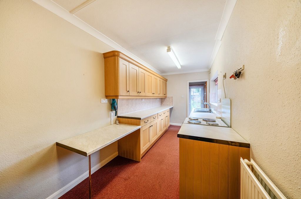 Property photo 3 of 12 Kitchen