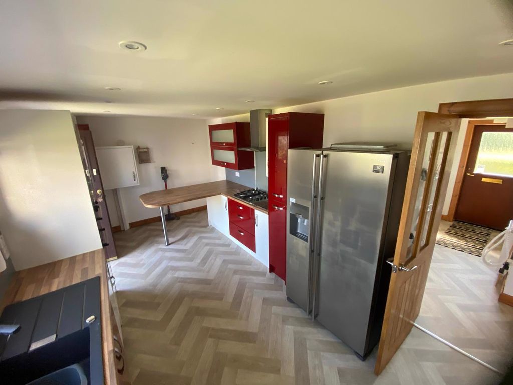 Property photo 2 of 10 Kitchen With American Fridge Freezer