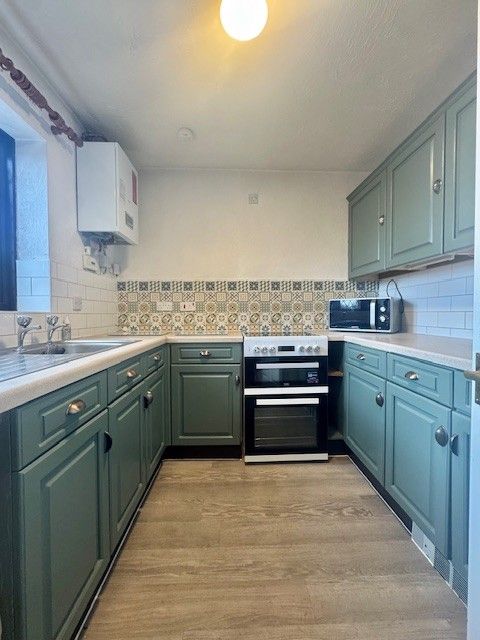 Property photo 2 of 9 Kitchen