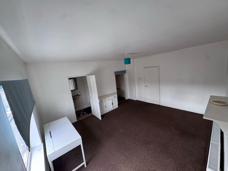 Property photo 1 of 5 A Bright And Spacious Living Room Featuring Large ...