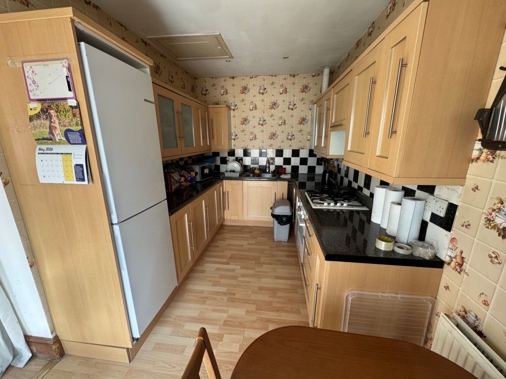 Property photo 2 of 12 Kitchen Area