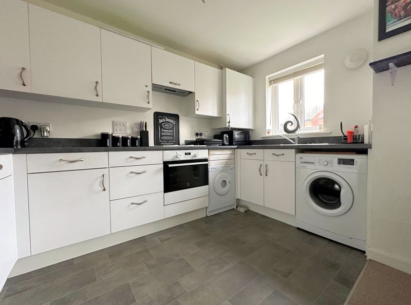 Property photo 3 of 12 Kitchen Area
