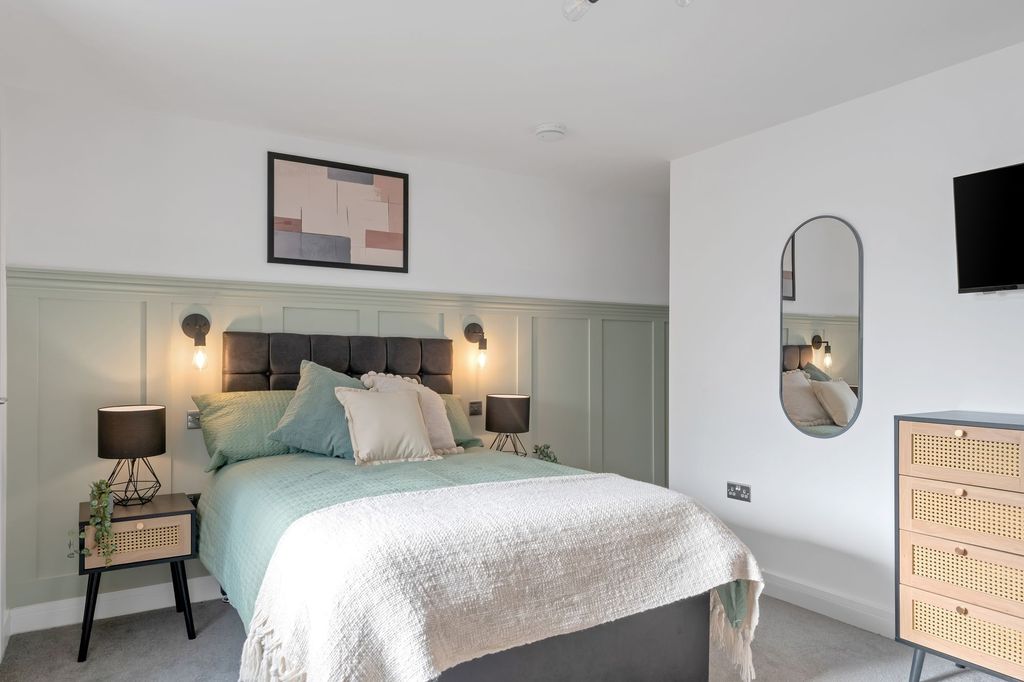 Property photo 3 of 7 Bright And Inviting Master Bedroom Featuring A Plu...