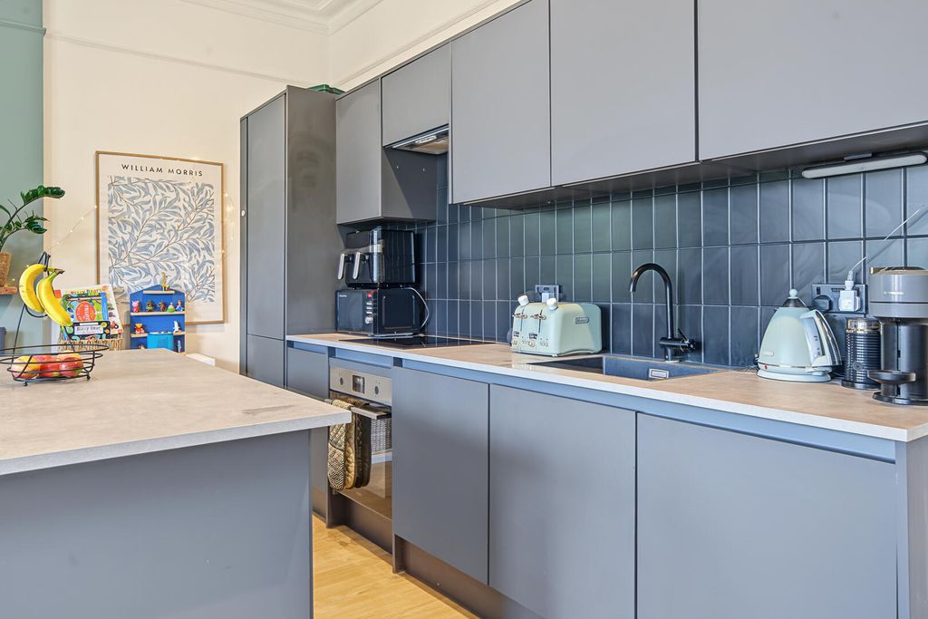 Property photo 3 of 8 Kitchen