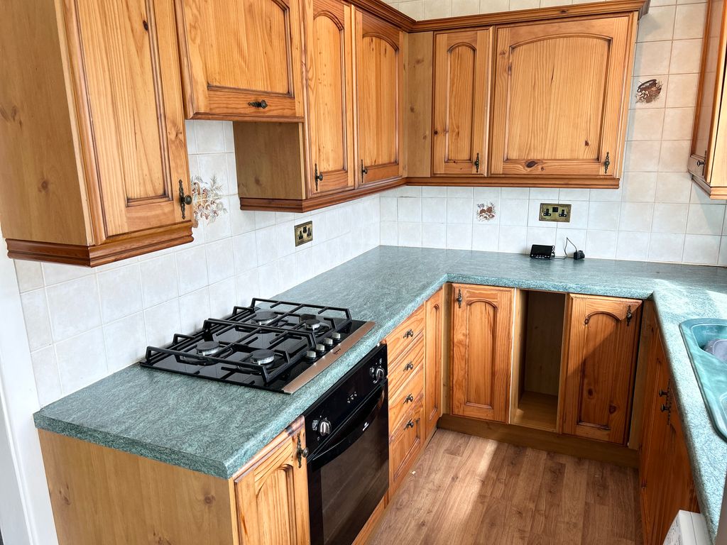 Property photo 3 of 12 Kitchen