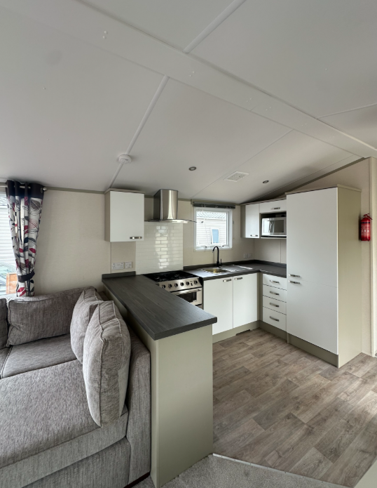 Property photo 3 of 3 Modern Fitted Kitchen In The Atlas Chrous With White Cabinets, Dark Worktops And Appliances
