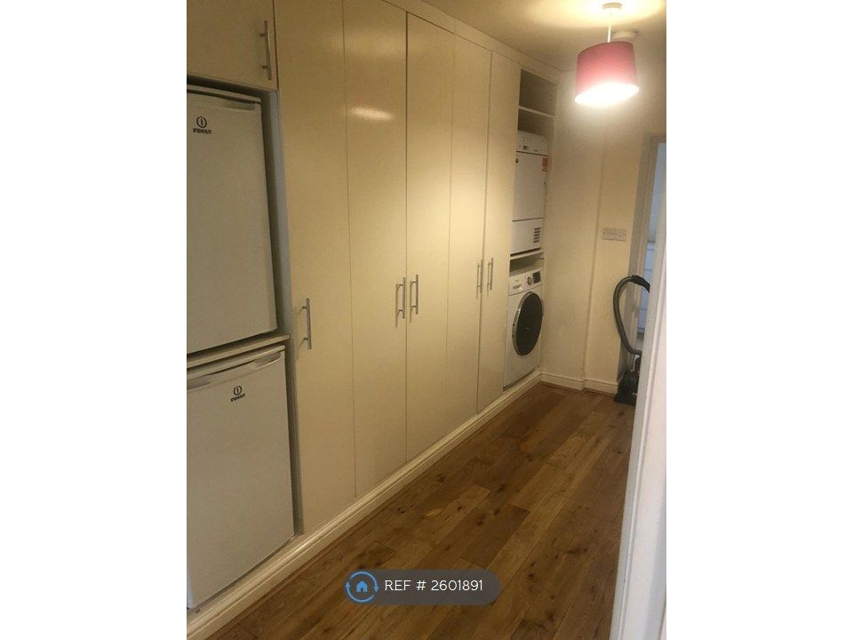 Property photo 3 of 8 Hallway Storage And Appliances