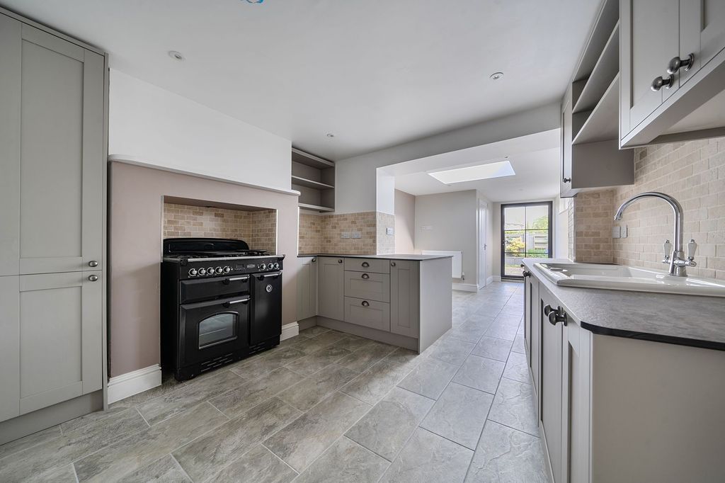 Property photo 2 of 16 Kitchen Leading Into Dining Space