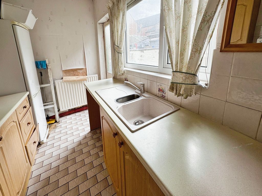 Property photo 2 of 12 Kitchen