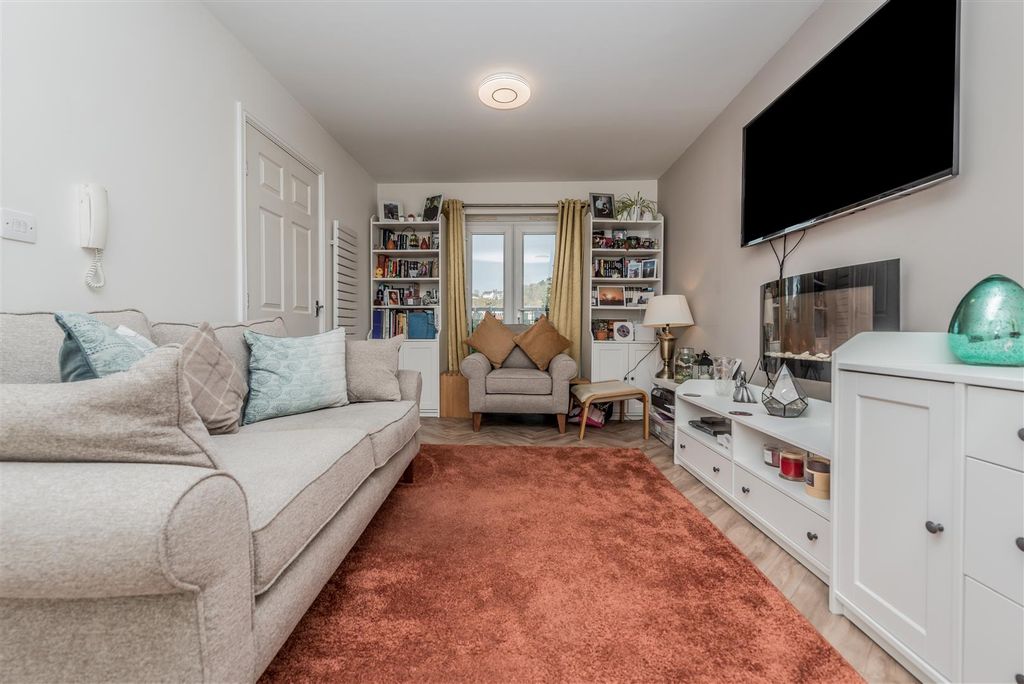 Property photo 2 of 17 Living Room & Dining Area: