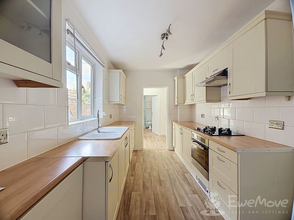 Property photo 3 of 24 Cream Kitchen With Wood Effect Worktops