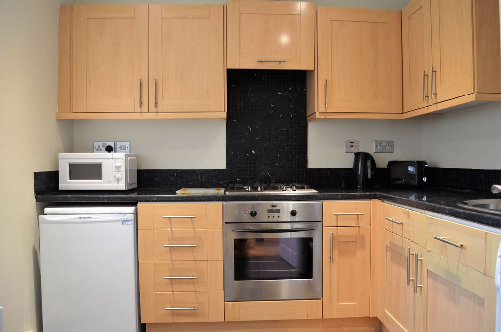 Property photo 3 of 9 Kitchen