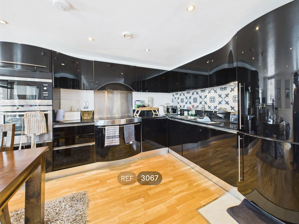 Property photo 1 of 15 Kitchen/Living Area