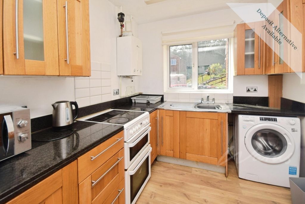 Property photo 2 of 9 Kitchen