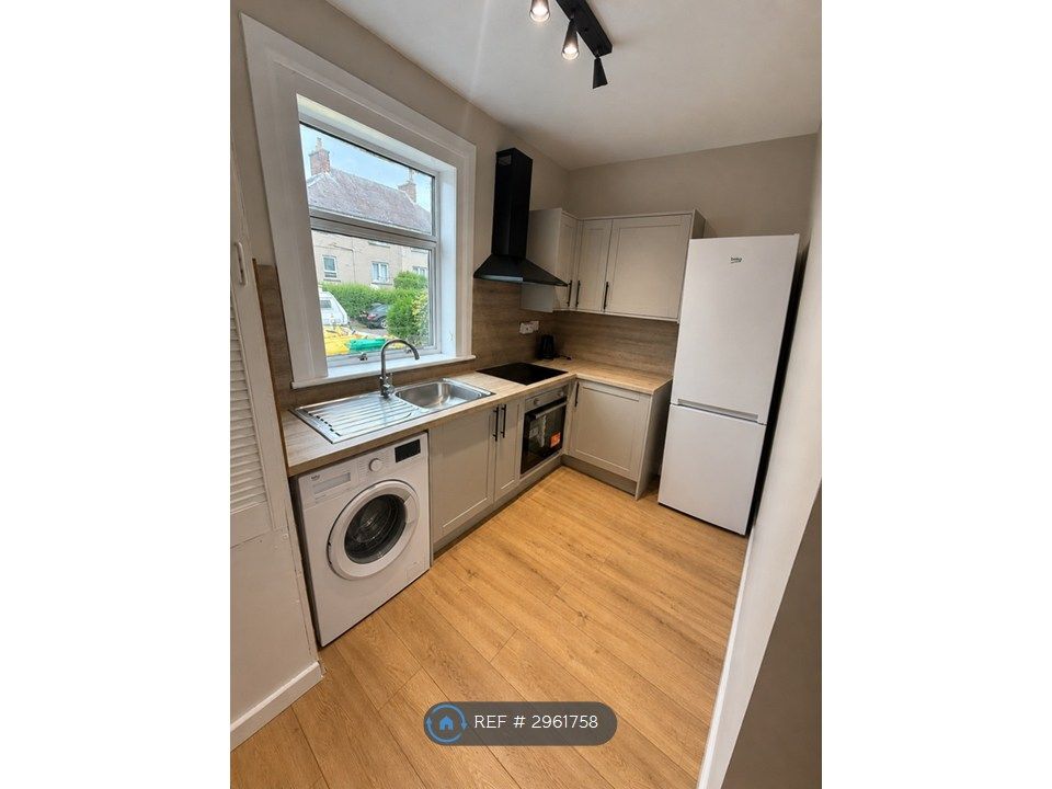 Property photo 1 of 12 Kitchen