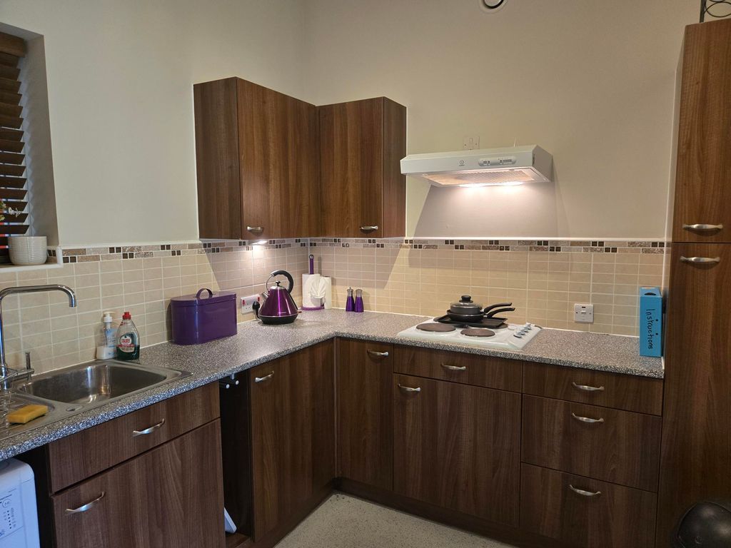 Property photo 2 of 12 Kitchen