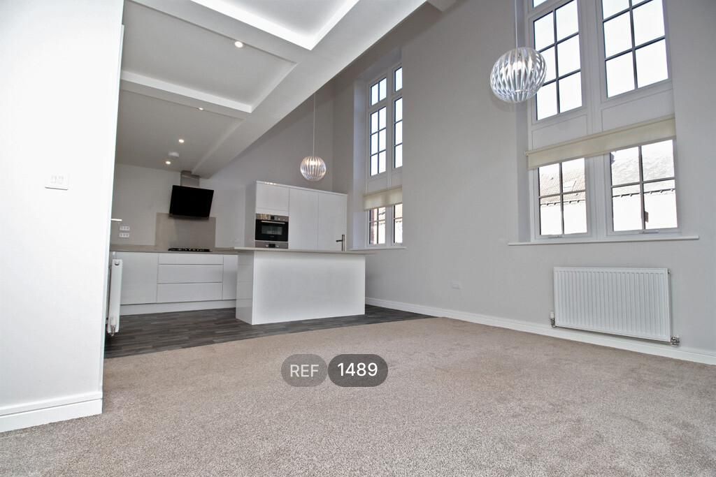 Property photo 3 of 9 Kitchen/Living Area