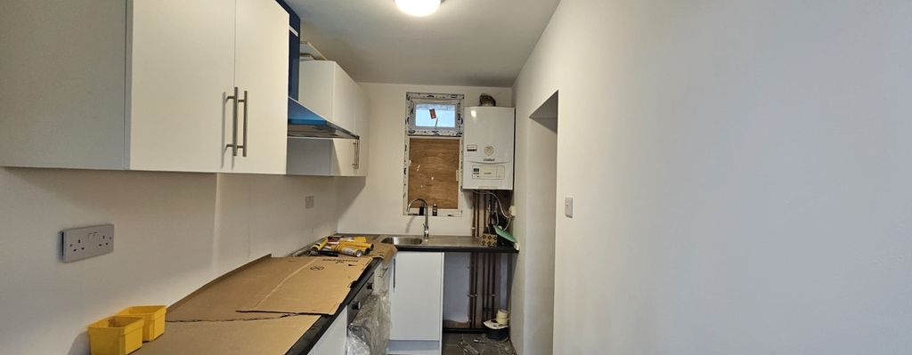 Property photo 3 of 12 Kitchen