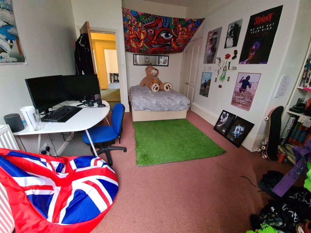 Property photo 1 of 9 A Spacious And Inviting Master Bedroom Featuring A...