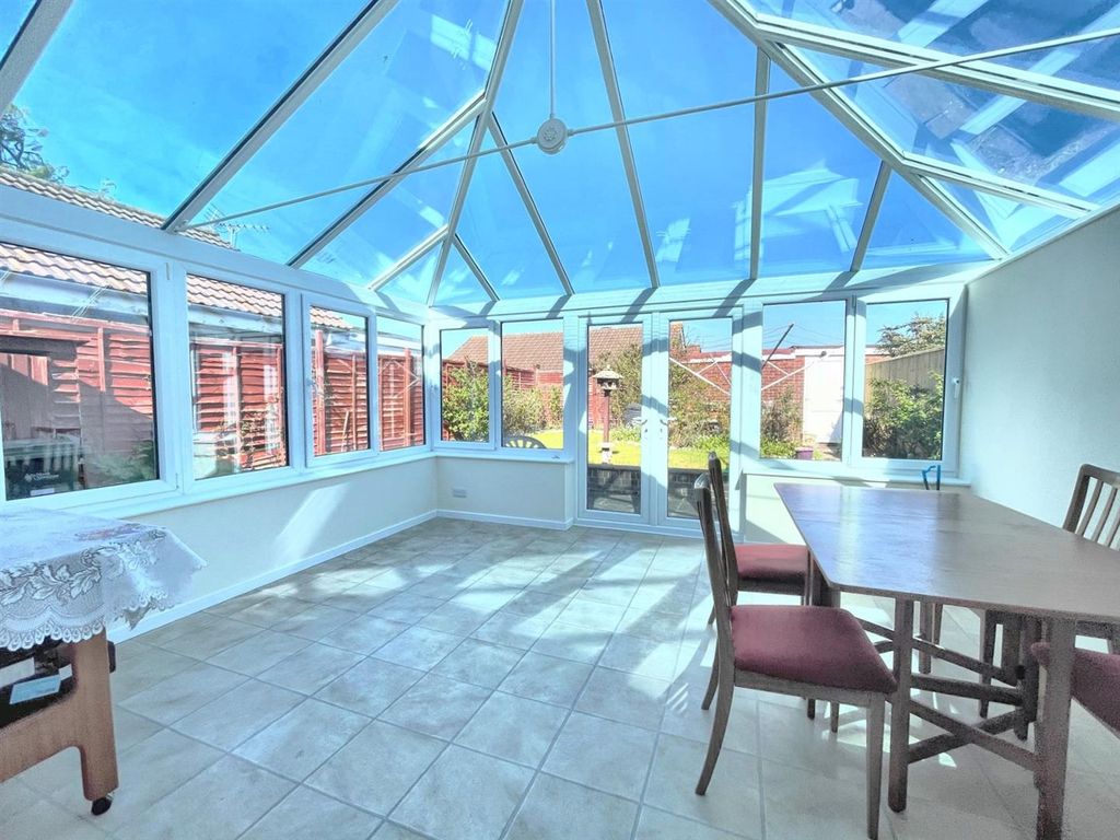 Property photo 2 of 12 Conservatory