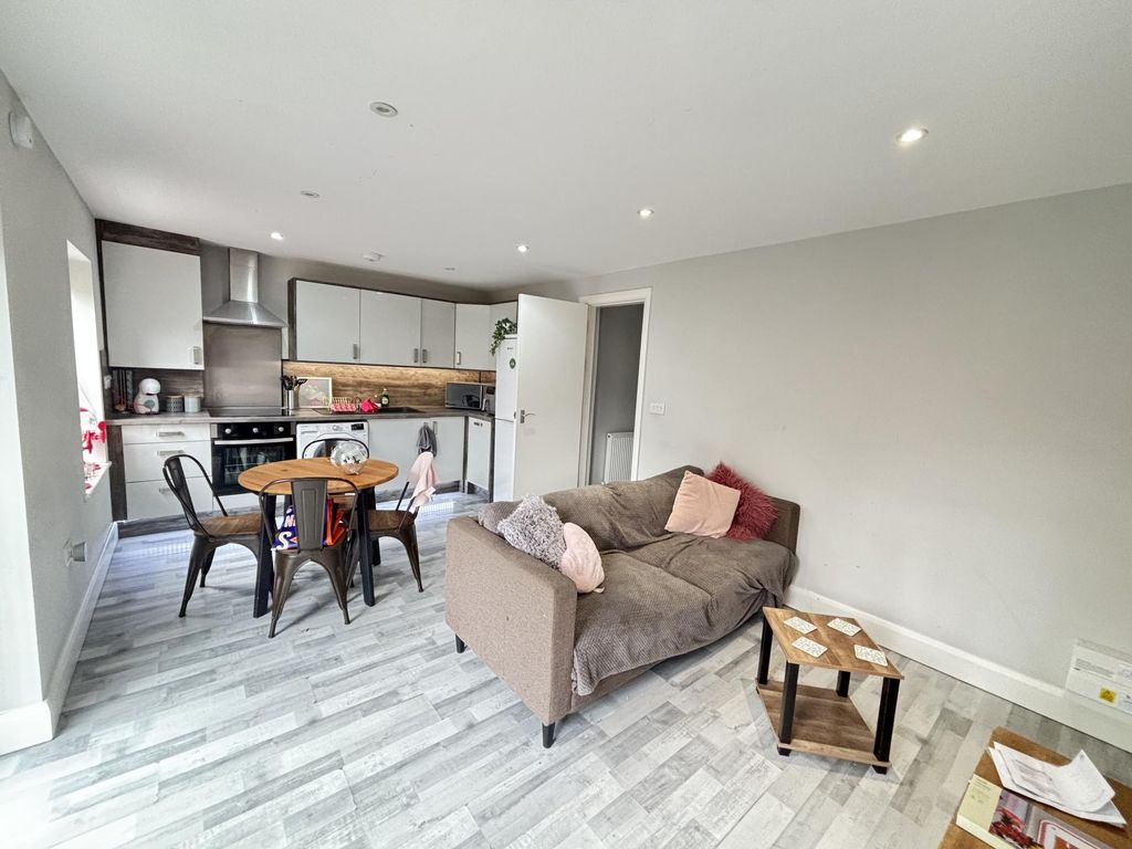 Property photo 1 of 9 Bright And Spacious Living Room With Modern Decor,...