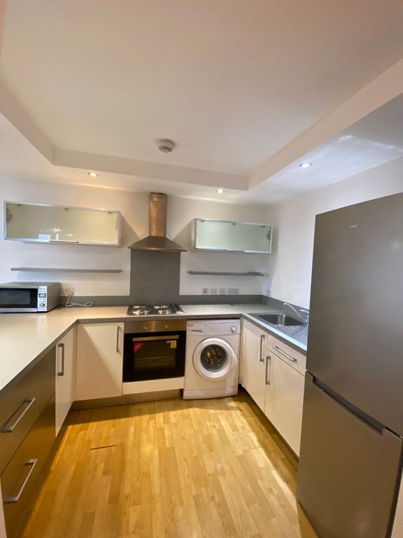 Property photo 3 of 9 Kitchen