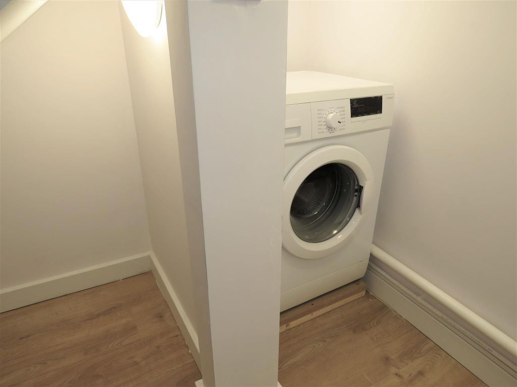 Property photo 2 of 13 Utility Room