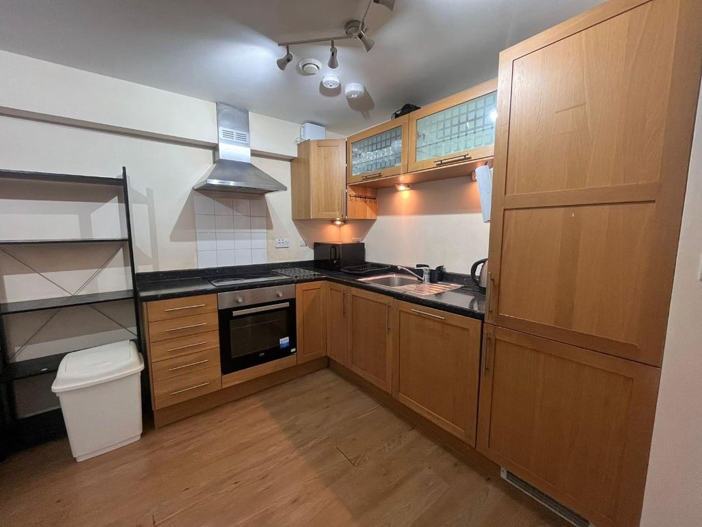 Property photo 3 of 13 Kitchen