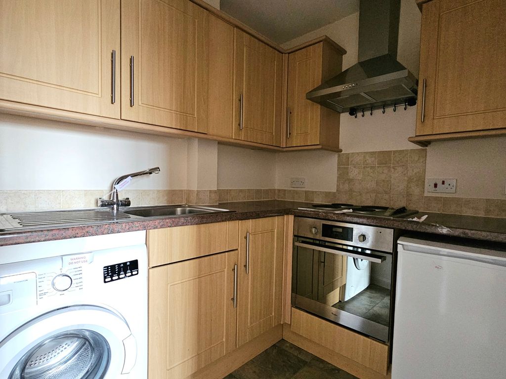 Property photo 3 of 12 Kitchen