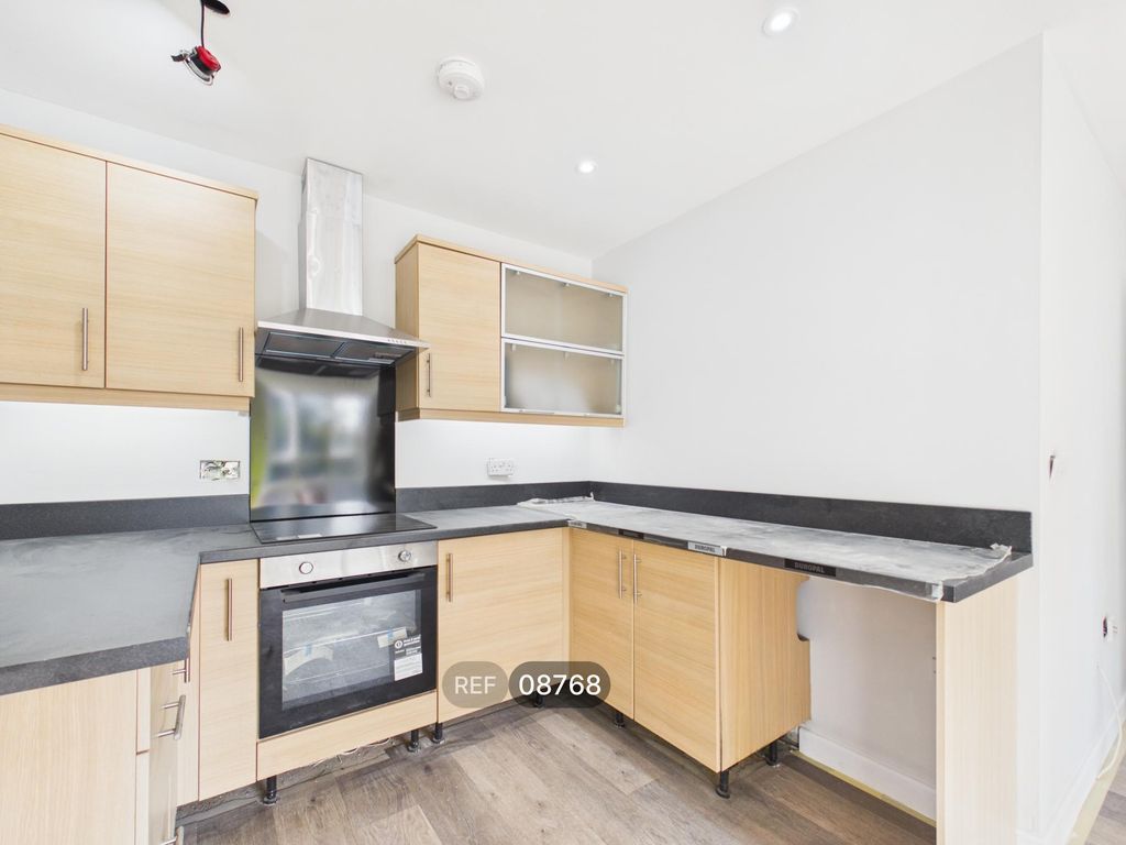 Property photo 1 of 11 Kitchen/Living Area