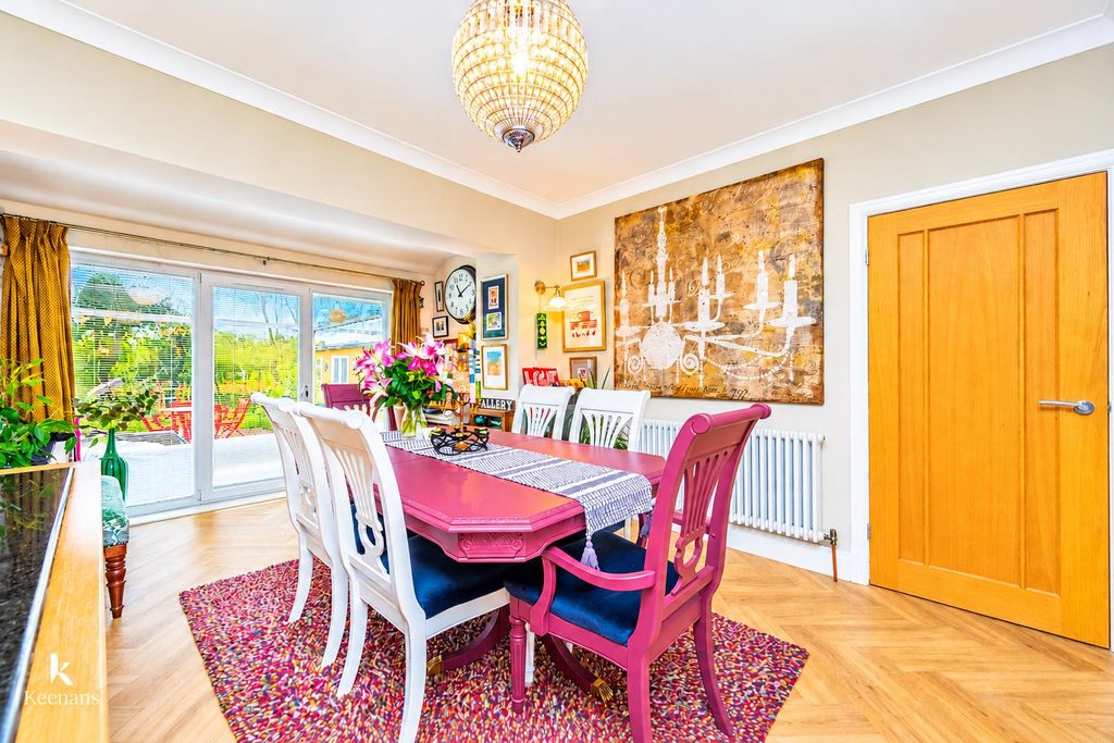 Property photo 3 of 44 Vivid Magenta Dining Room With Gallery Wall.Png
