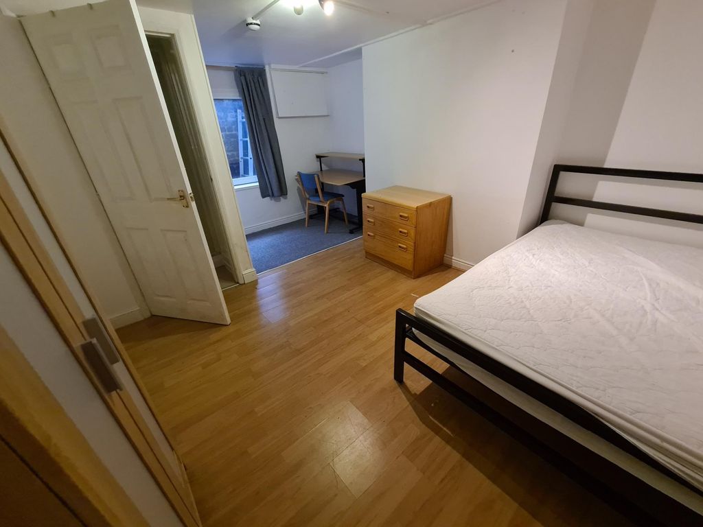 Property photo 1 of 12 A Tidy Double Bedroom Featuring A Bed, Wooden Floo...