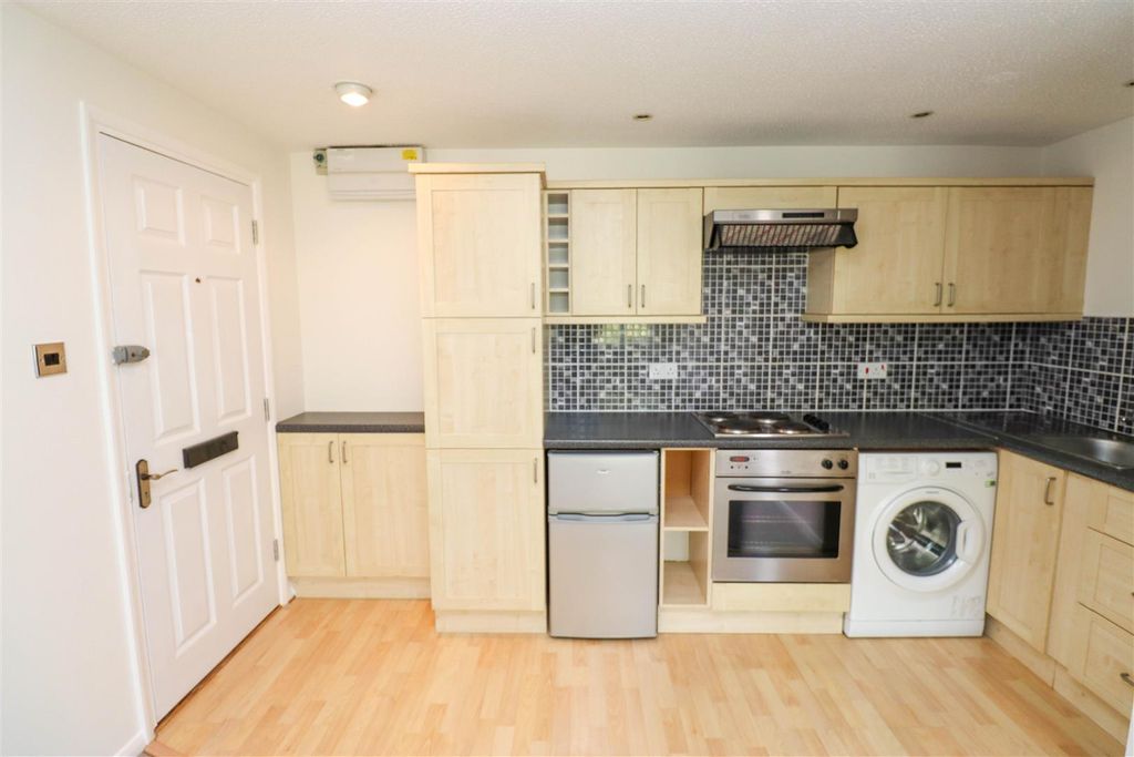 Property photo 3 of 10 Kitchen Area