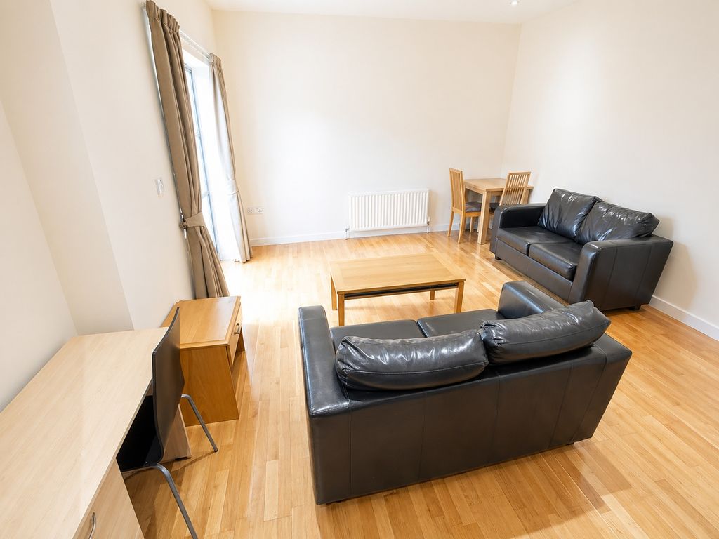 Property photo 1 of 7 Bright, Spacious Lounge With Sleek Leather Sofas...