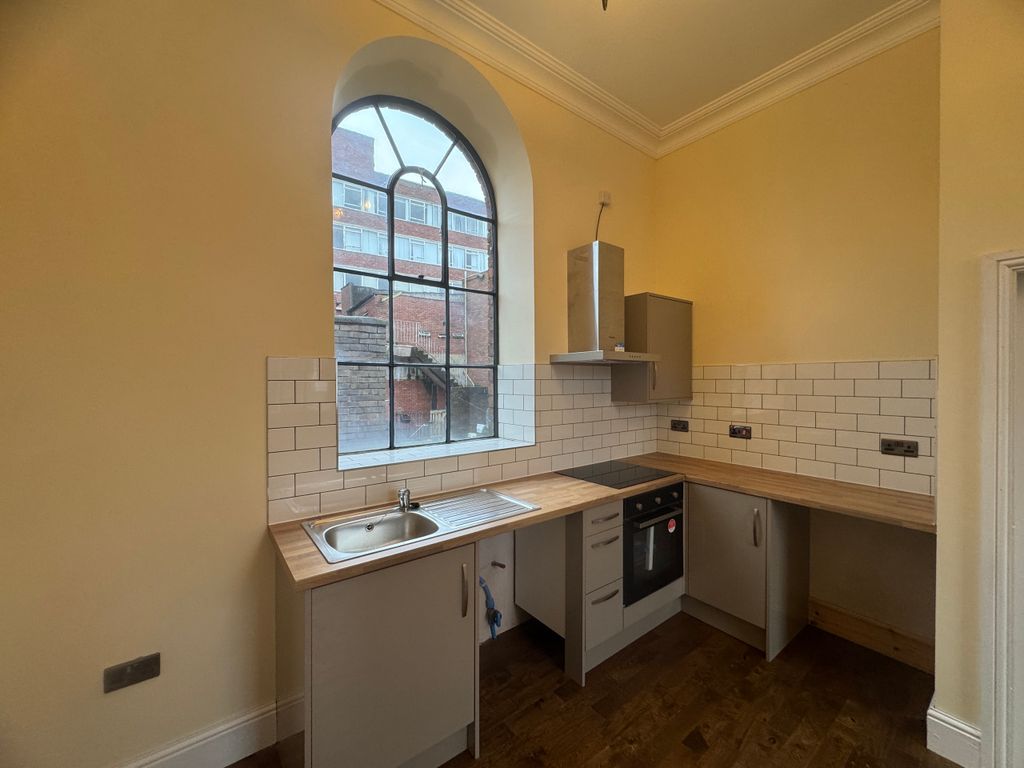 Property photo 1 of 5 Kitchen Area