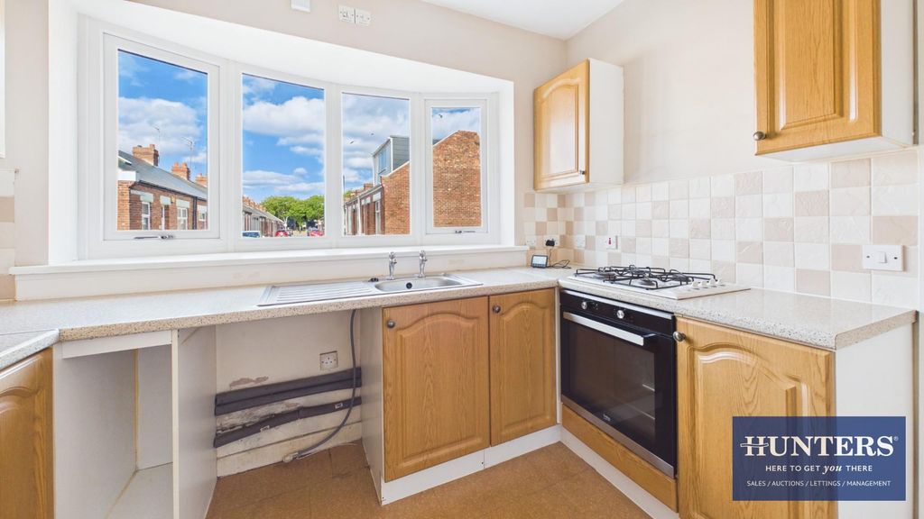 Property photo 3 of 16 Kitchen