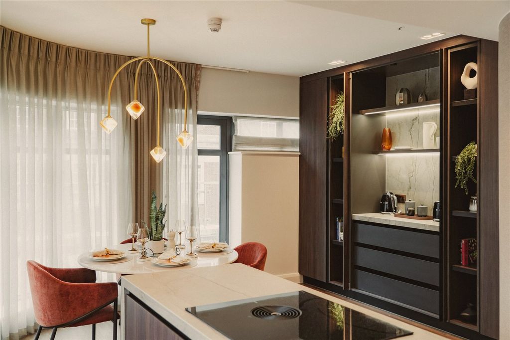 Property photo 3 of 17 Kitchen And Dining