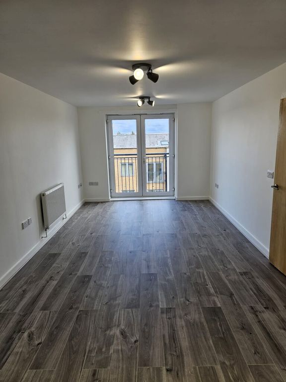 Property photo 3 of 13 Living Area