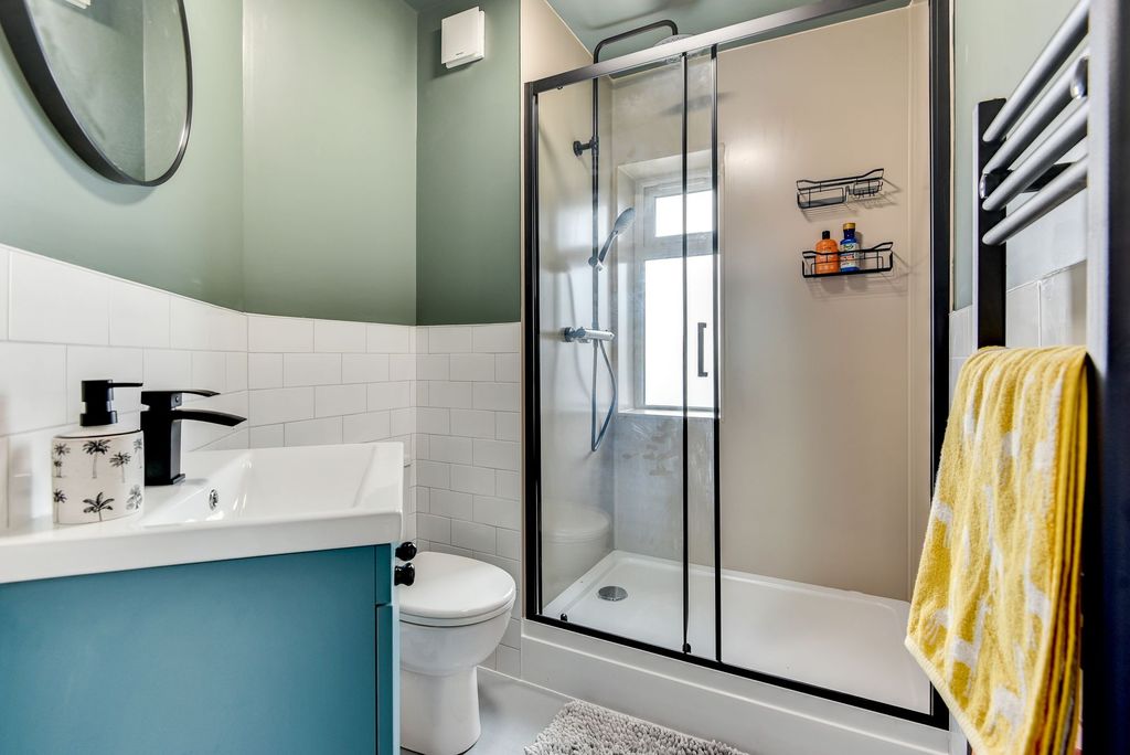 Property photo 2 of 6 A Stylish Bathroom Featuring A Modern Shower Enclo...